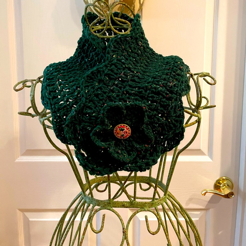 Green neck scarf with enamel pin